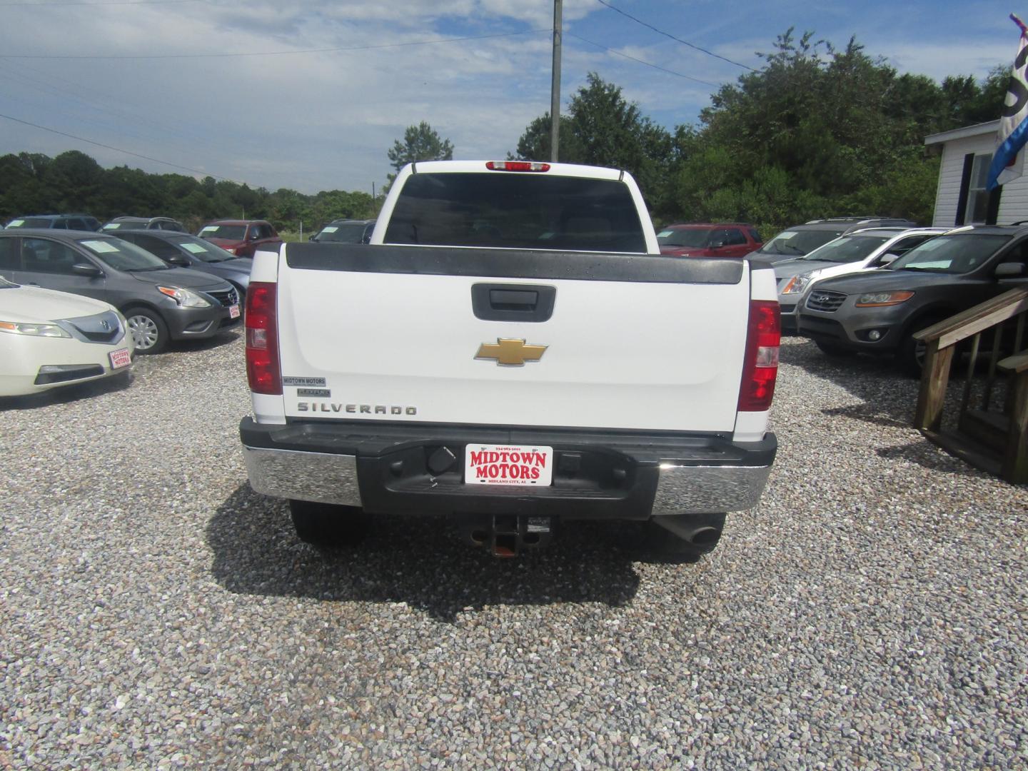 2013 White /Tan Chevrolet Silverado 2500HD LT Ext. Cab 4WD (1GC2KXCG3DZ) with an 6.0L V8 OHV 16V FFV engine, Automatic transmission, located at 15016 S Hwy 231, Midland City, AL, 36350, (334) 983-3001, 31.306210, -85.495277 - Photo#6